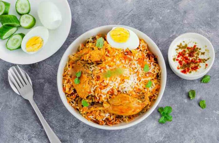 CHICKEN EGG BIRYANI (Served With Raita)