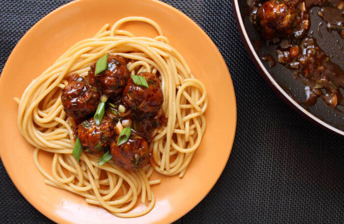 Veg. Chowmein + Manchurian(4pcs)